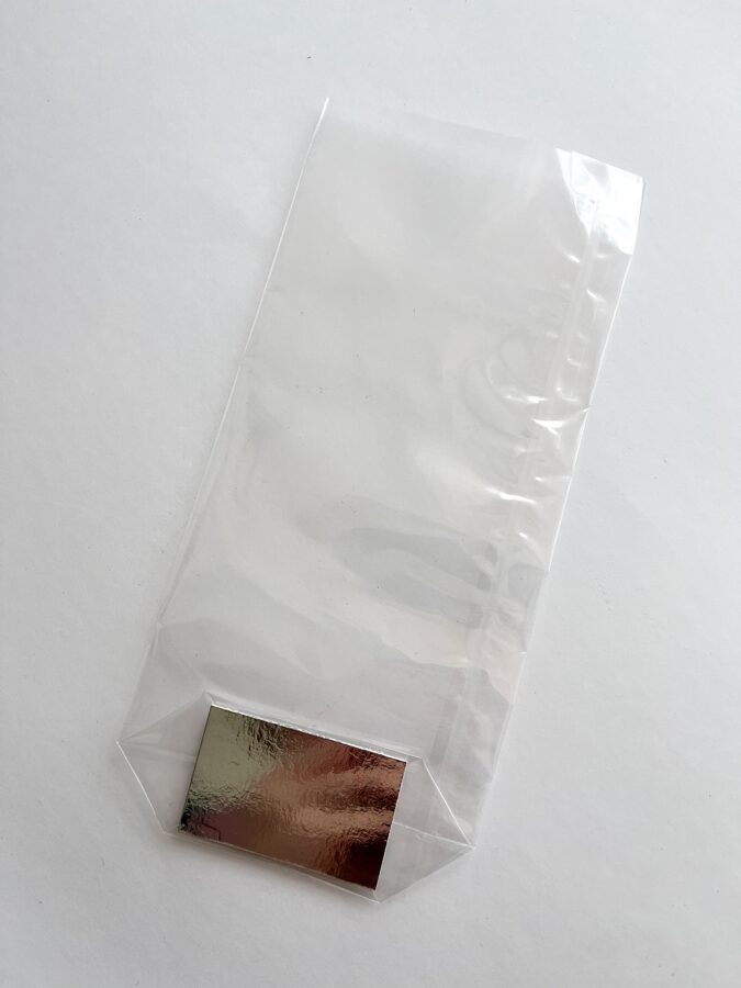 Caurspīdīgs maisiņš ar sudraba pamatni 1gb